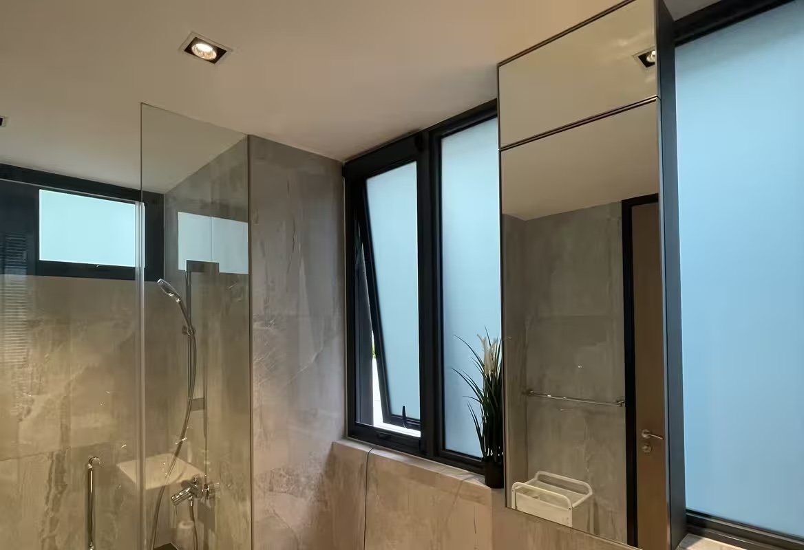 Minimalist window mesh blending into a contemporary interior