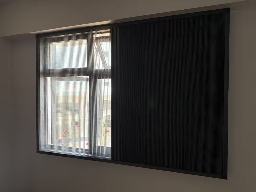 Roman blind filtering daylight in a Singapore home