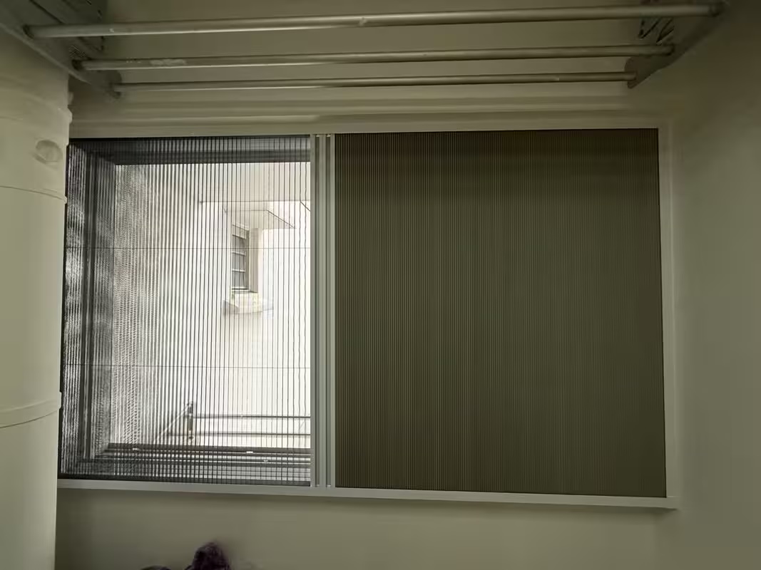 Roman blind set part-way to balance light and privacy