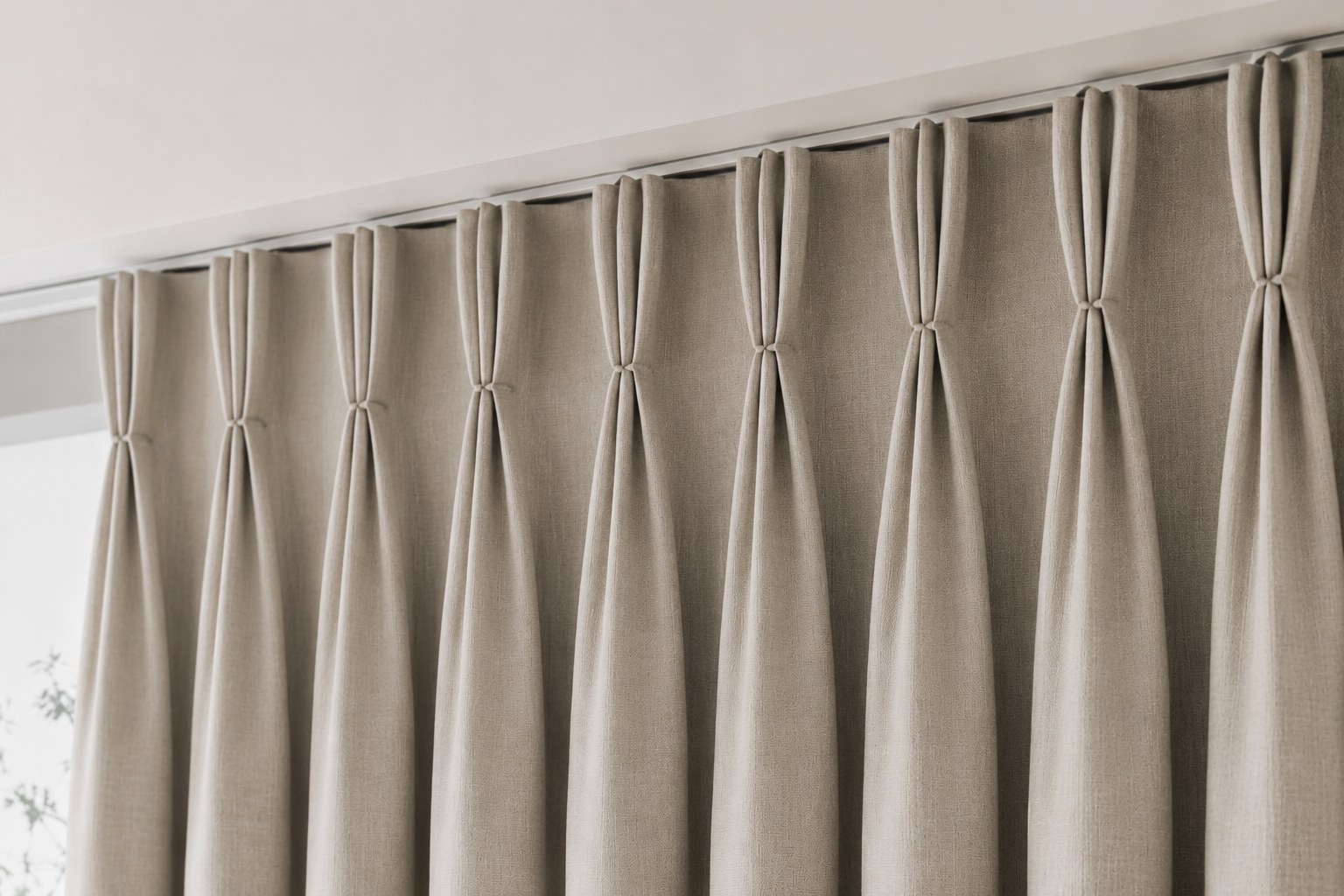 Double-pleated curtains with crisp, evenly spaced pinch pleats