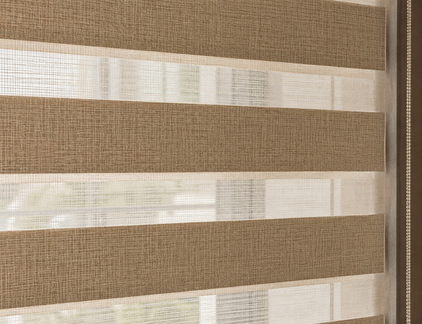 Combi zebra blind with its sheer and solid bands aligned for an open, filtered view