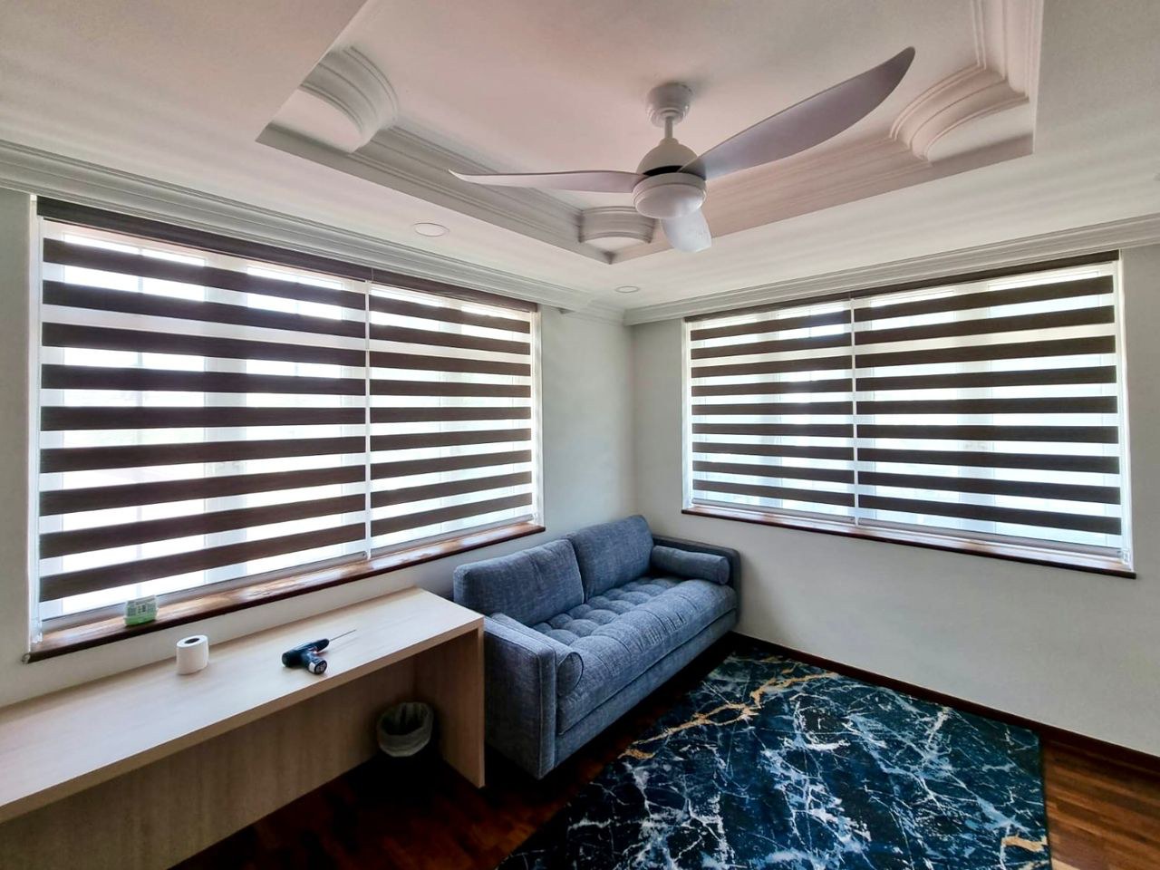 Combi blind fitted across a tall floor-to-ceiling window