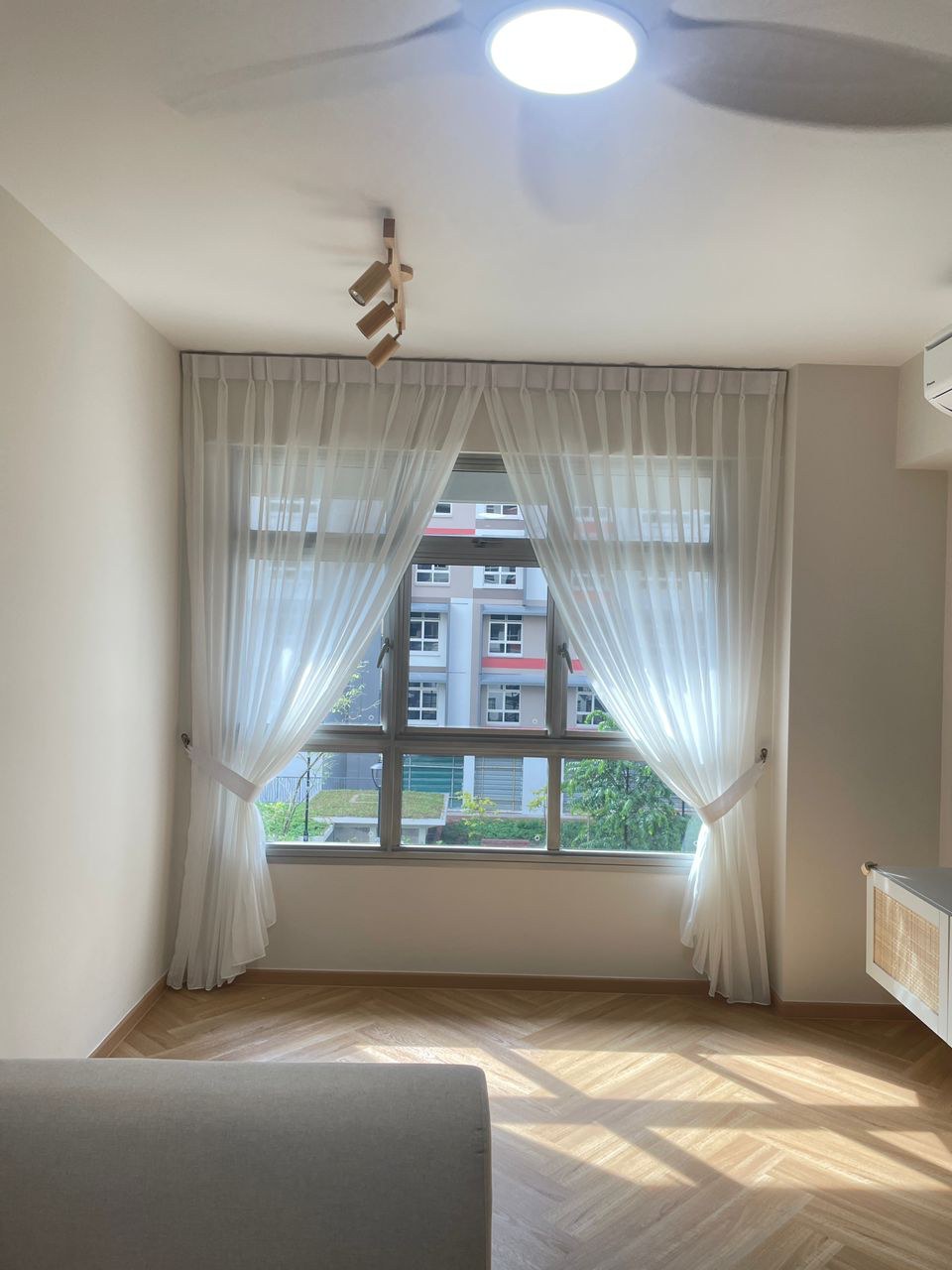 Soft daytime curtains filtering light in a bright room