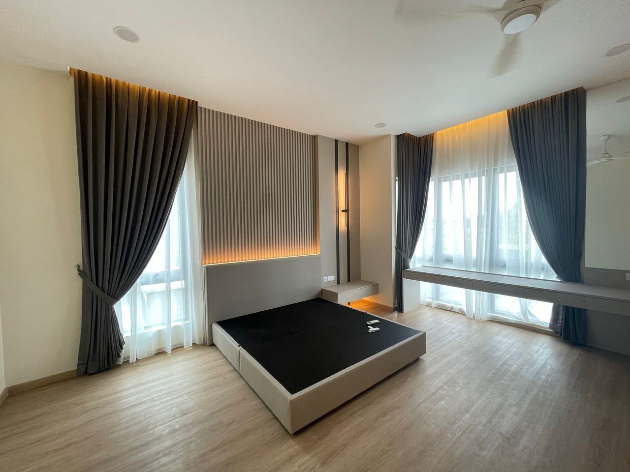 Floor-to-ceiling curtains framing a home window